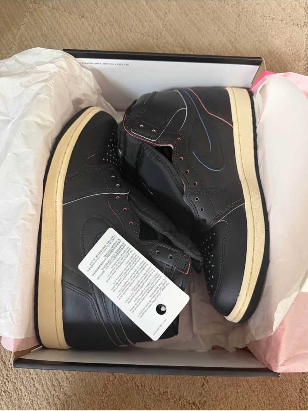 Jordan High-Top Sneakers in Black with Cream Sole and Blue/Pink Accents